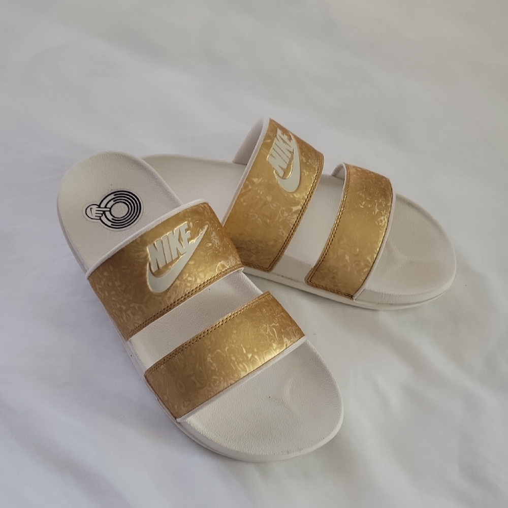 Nike White and Gold Slide Sandals